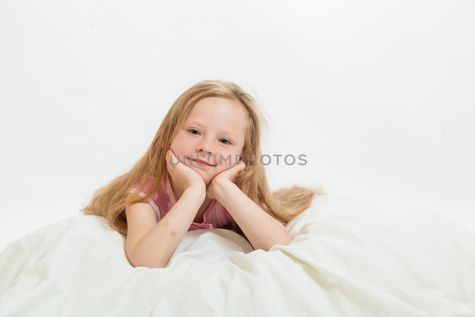 the beautiful little girl on the isolated background