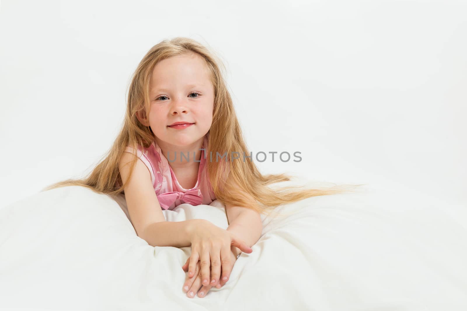 the beautiful little girl on the isolated background