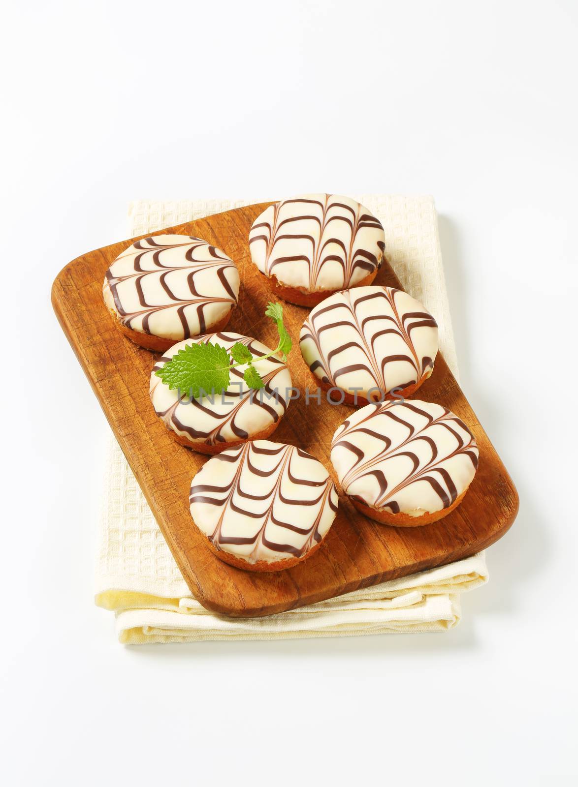 Chocolate-glazed mini cakes by Digifoodstock