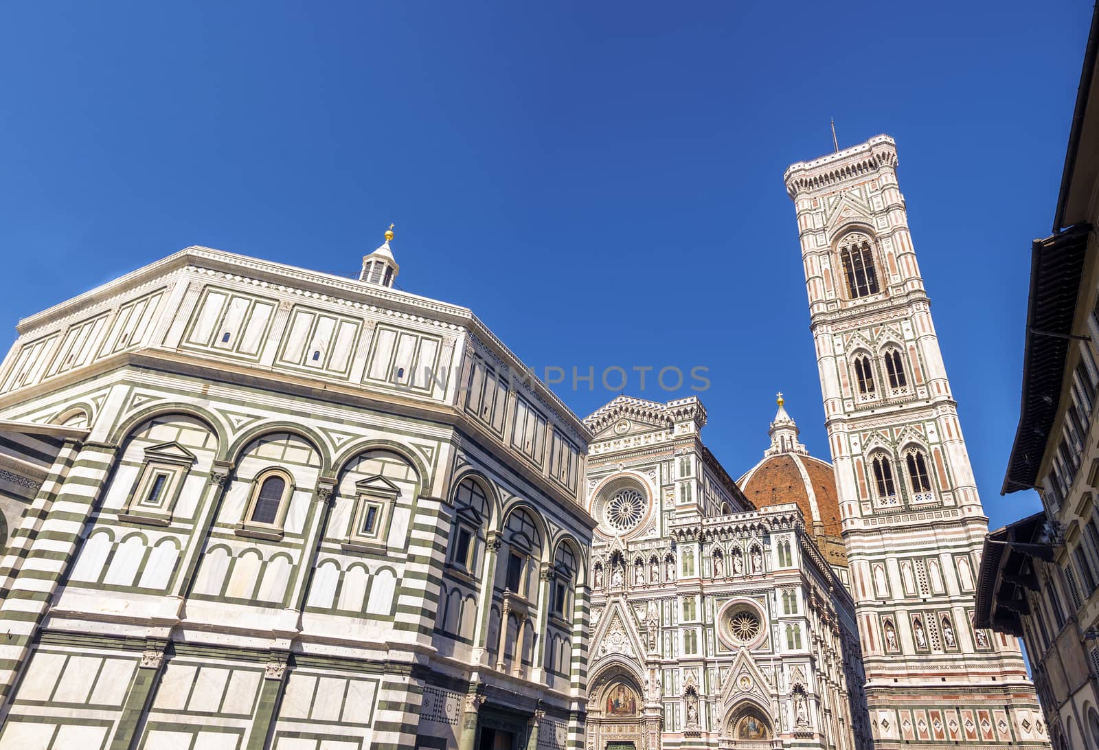 Piazza del Duomo, in Florence, Italy with the Basilica di Santa Maria del Fiore, Giotto's Campanile and the Baptistery of San Giovanni