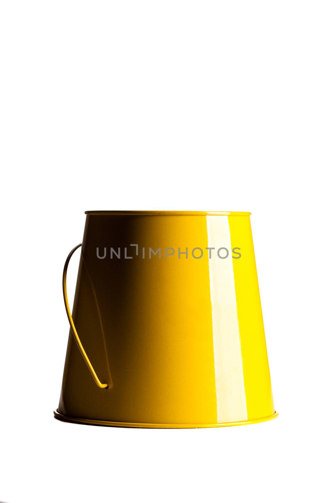 small yellow bucket isolated on white background