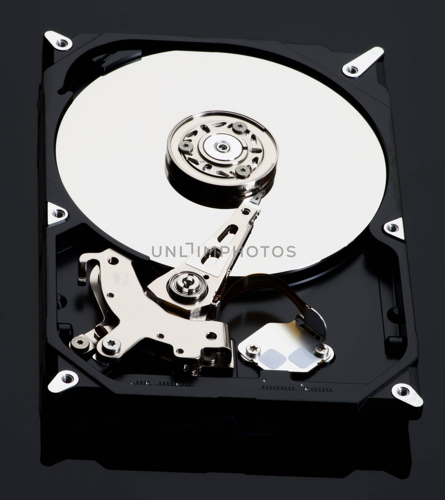 Opened Computer Hard Disk Drive isolated on Black background