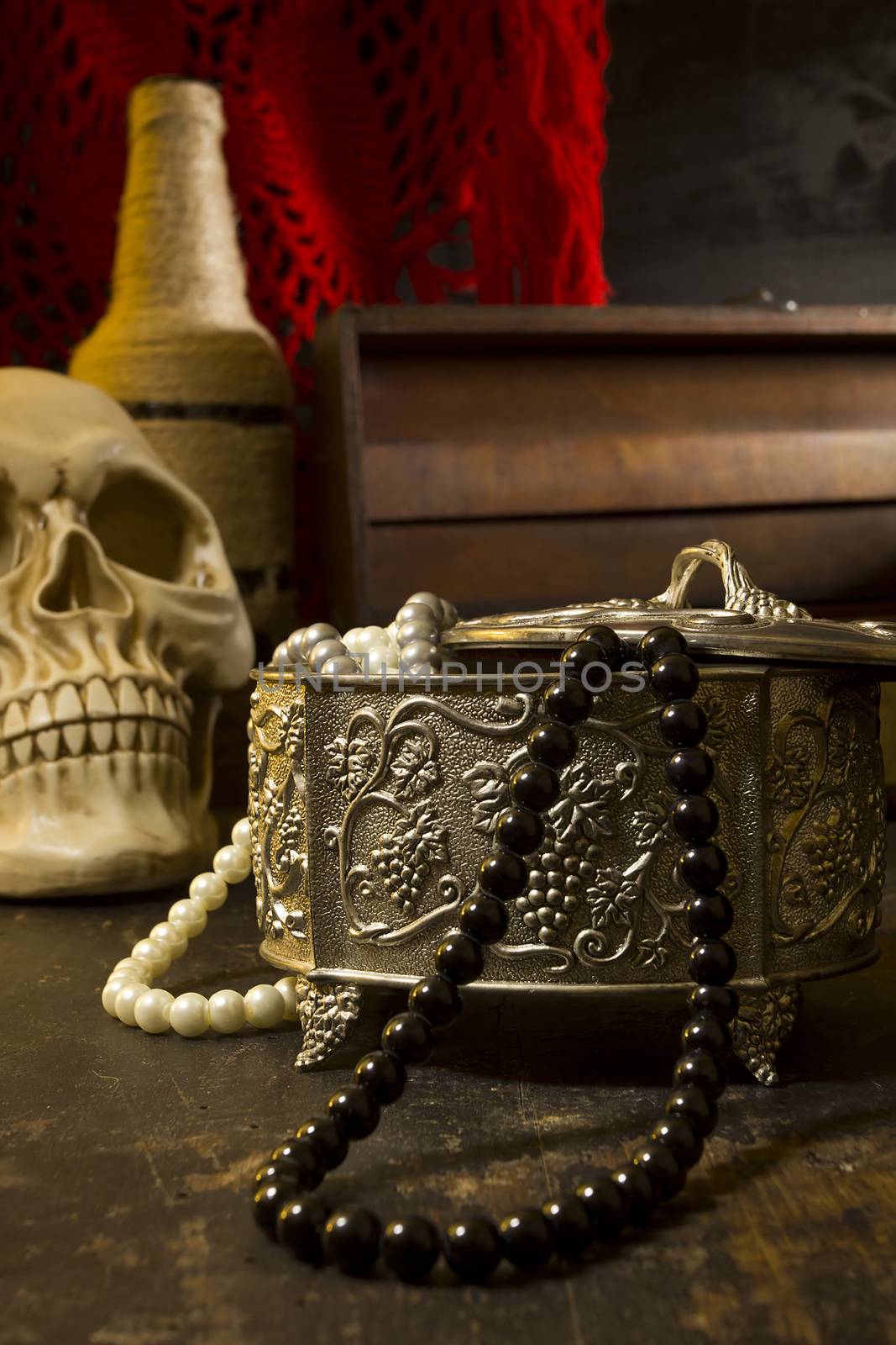 Vintage jewelry box on a wooden table