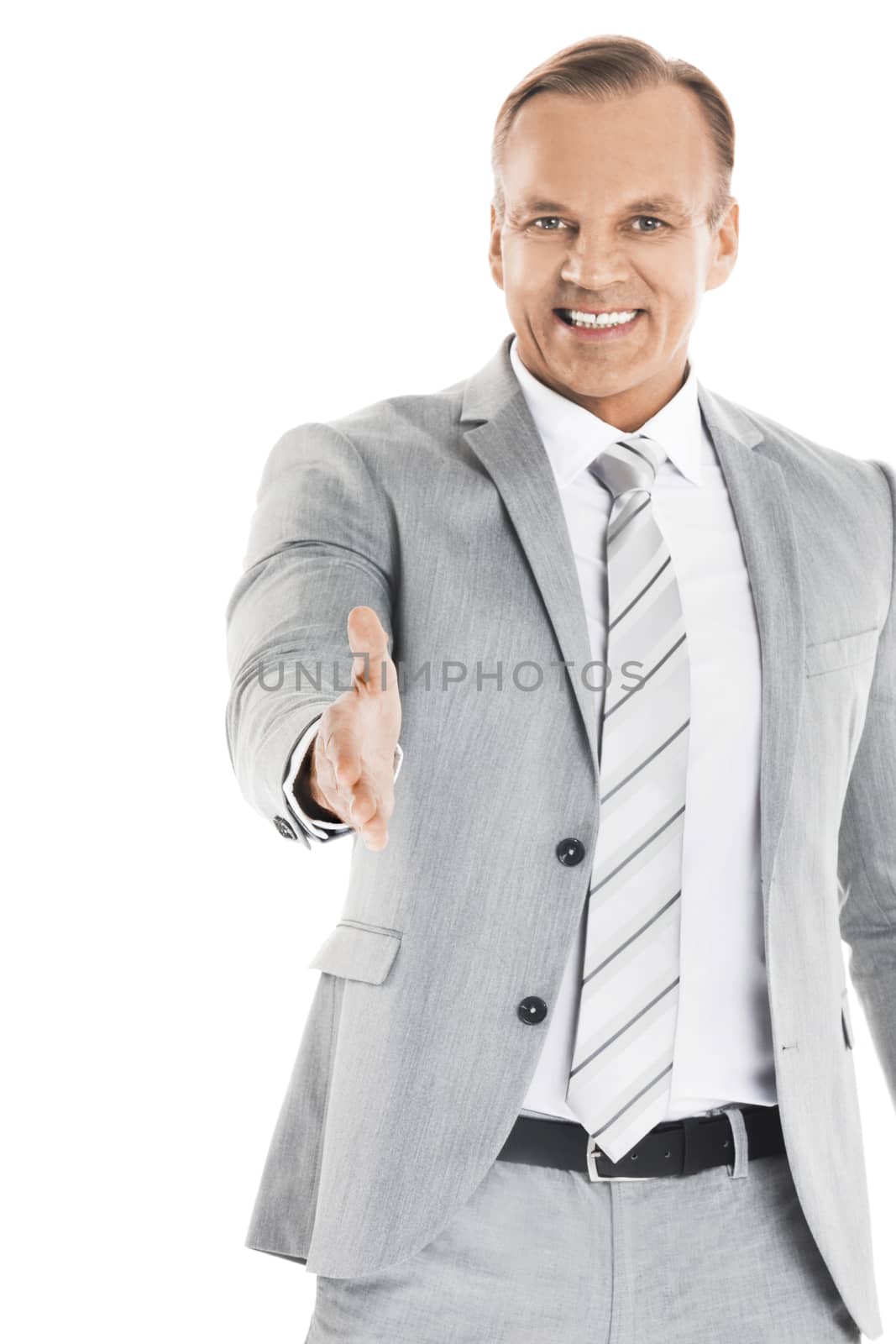 Business man stretching out hand for shaking and smiling, isolated on white background