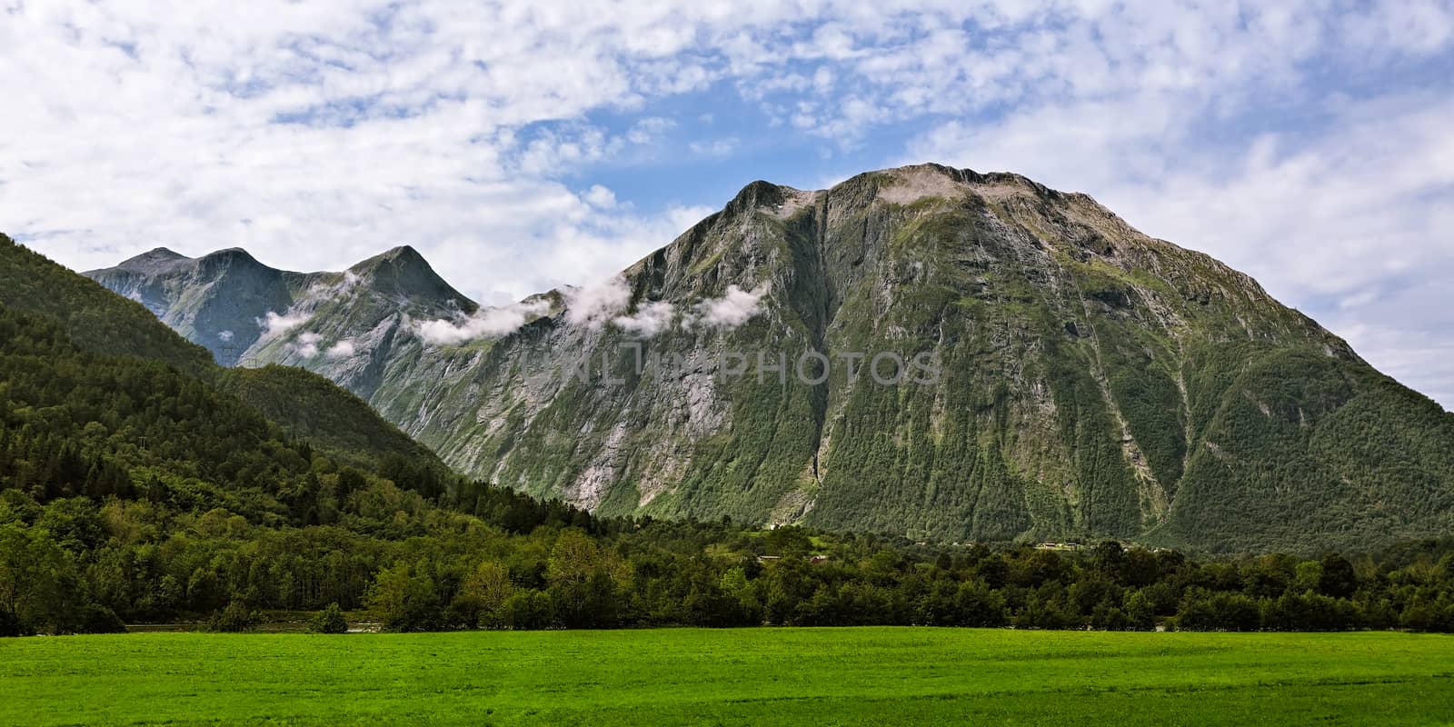 Panoramic view of the mountains near Andalsnes in Norway under a cloudy sky