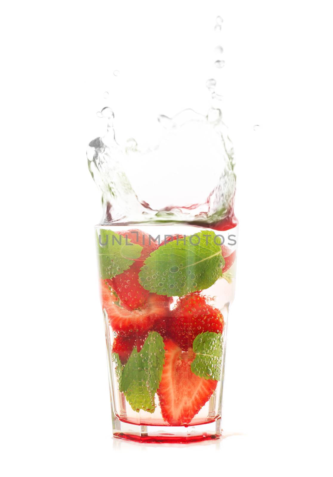 Strawberry mojito with splash isolated on white background