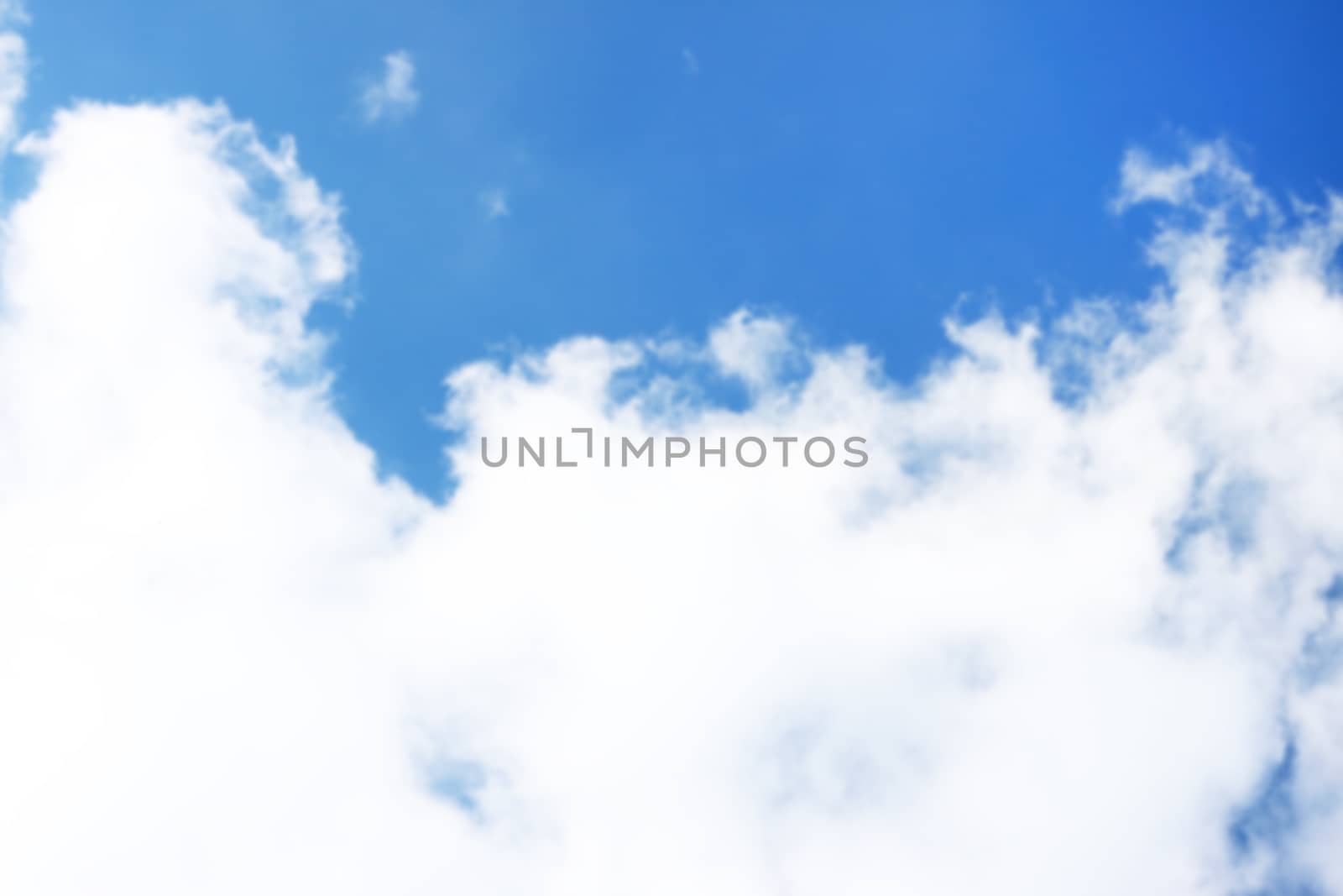 Beautiful blurred blue sky with clouds. Nature wallpaper background
