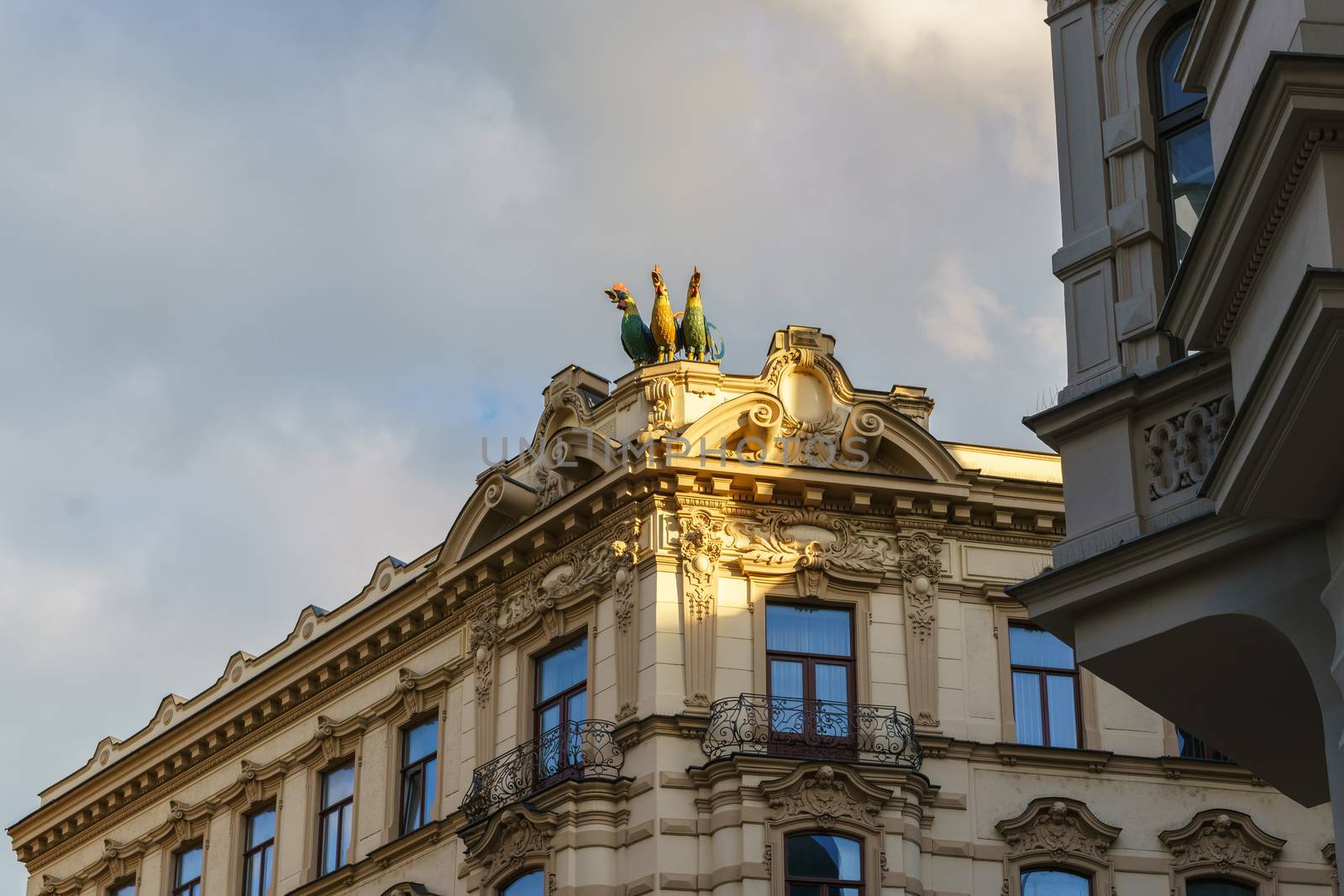 Beautiful facades of the historical building in Brno with "three gallos" .