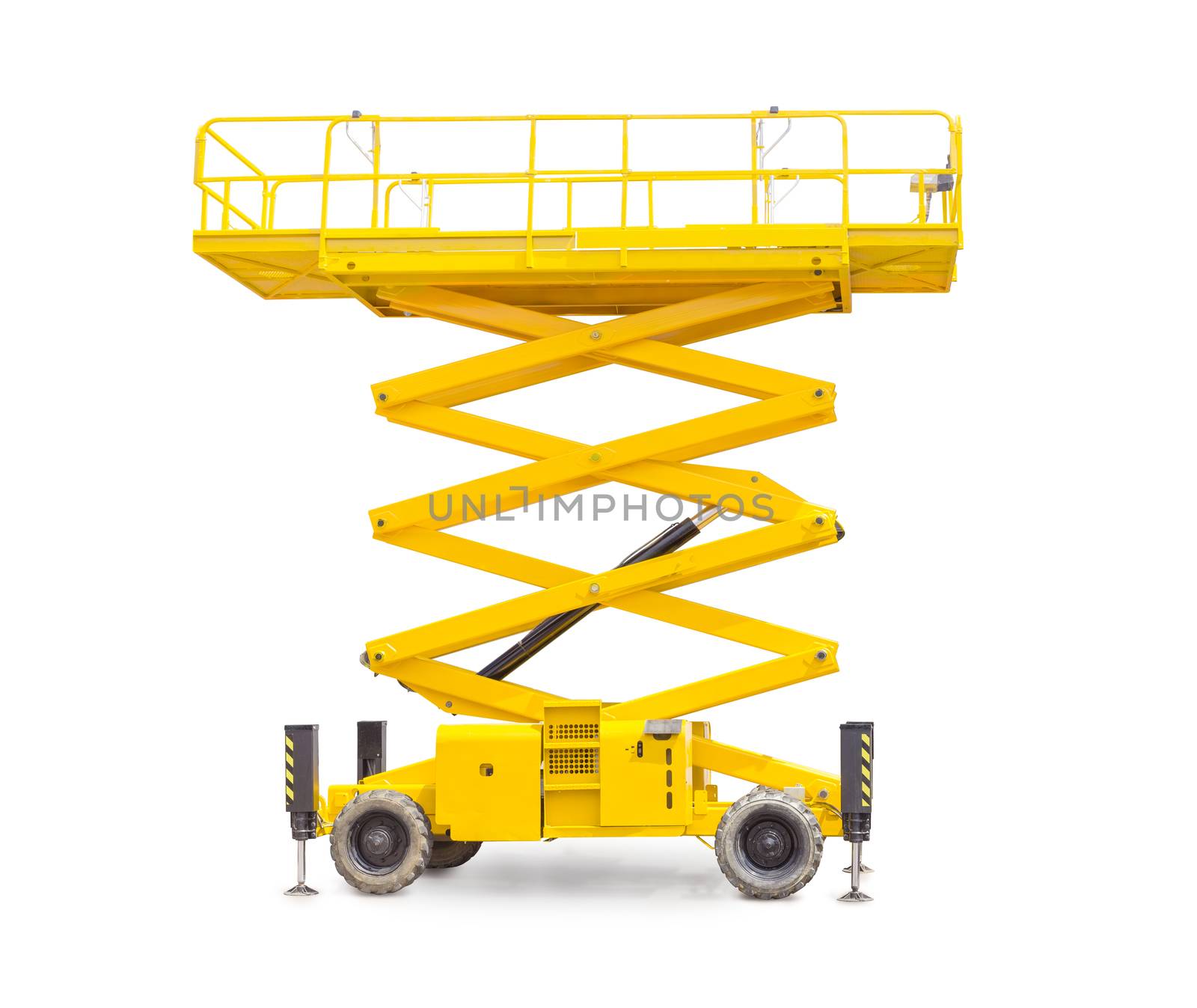 Yellow scissor wheeled lift on a light background
