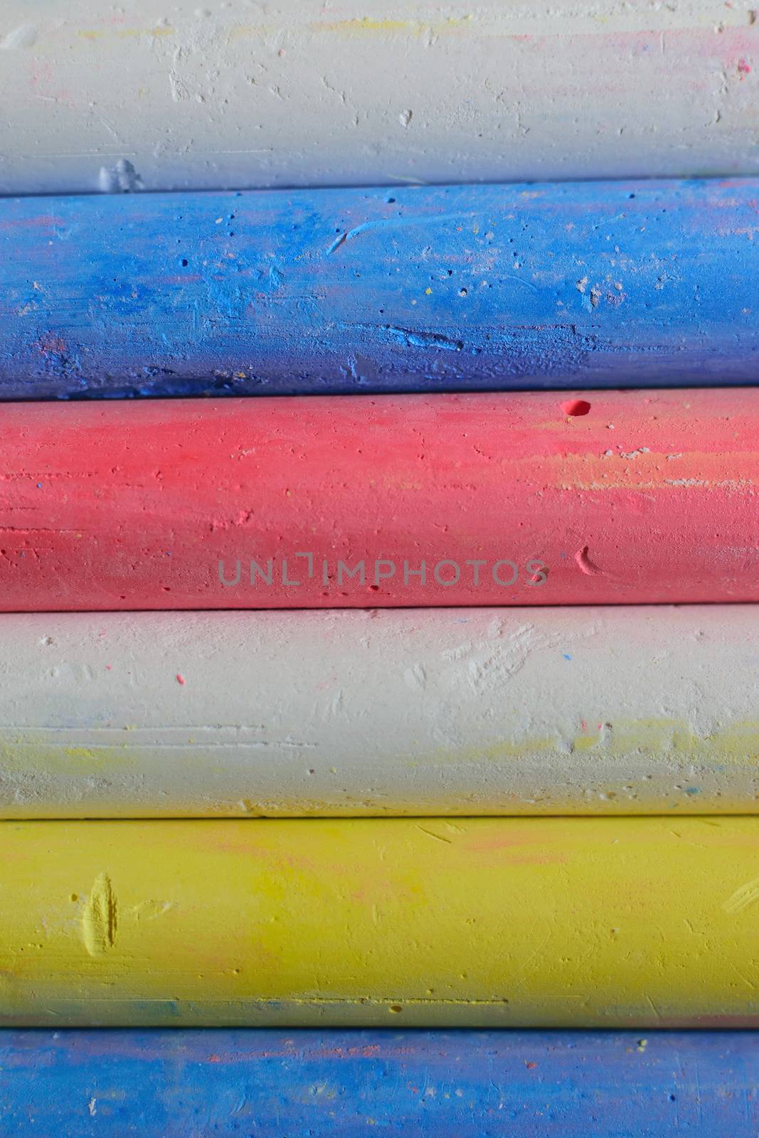 Macro Background texture colorful writing chalks in vertical frame