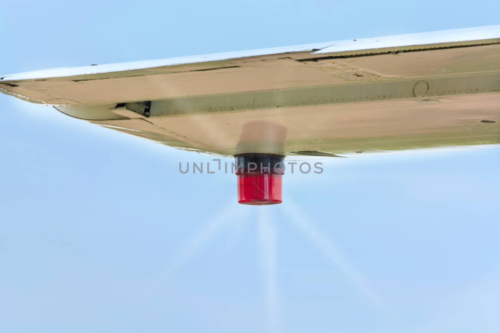 Wing of an airplane with position lighting.