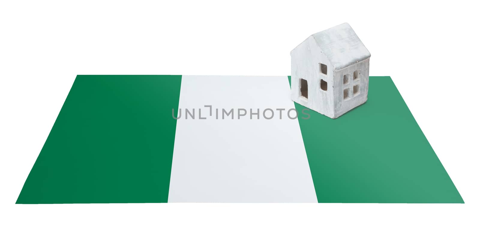 Small house on a flag - Nigeria by michaklootwijk