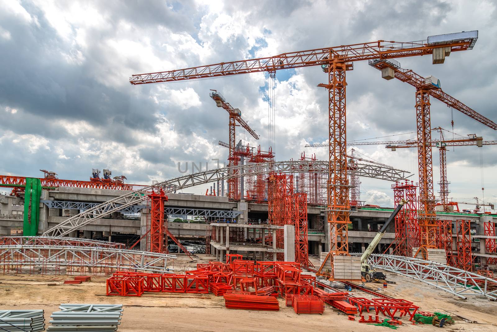 Cranes Working on Expressway Construction Sites in Asia