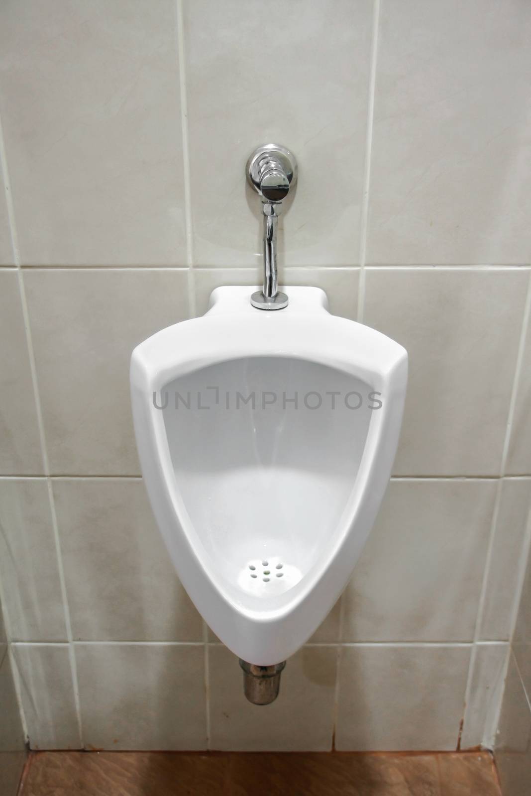 ceramic urinal by choochart_sansong