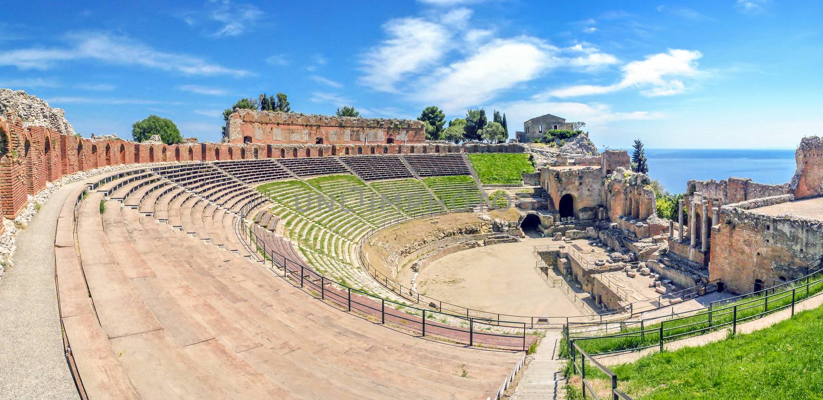 The ancient Greek Theater of Taormina in a sunny day Sicily, Italy