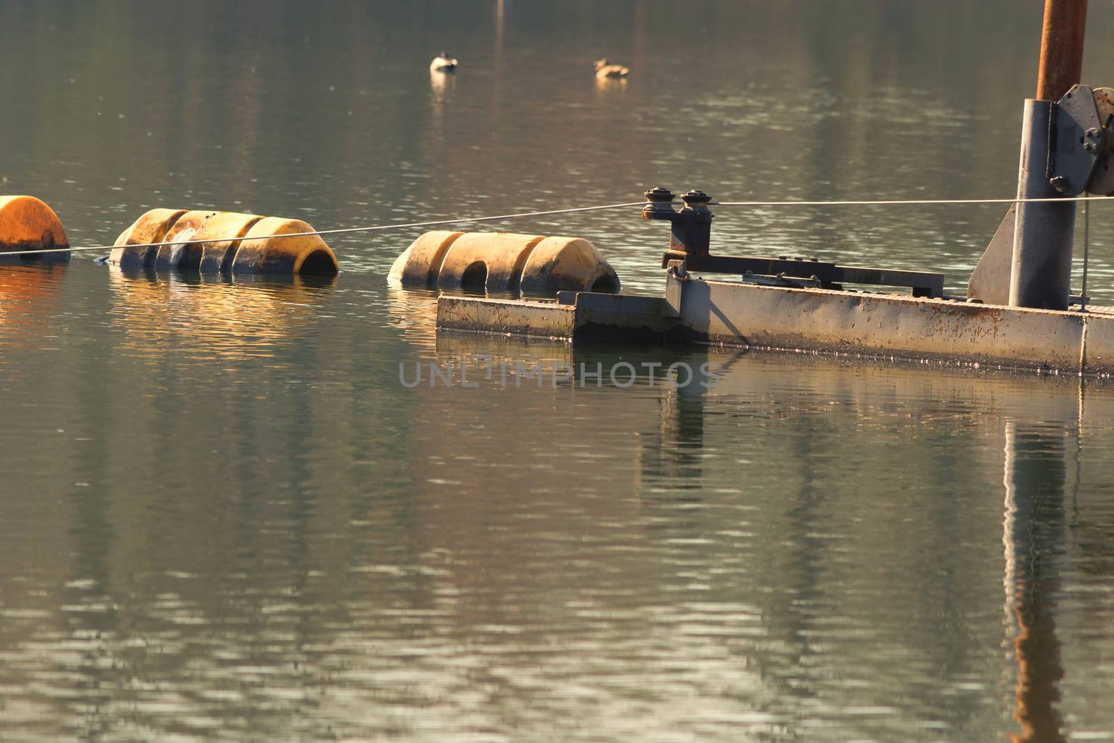 Cable installation or pipeline laying in the water with a so-called cable ship.
