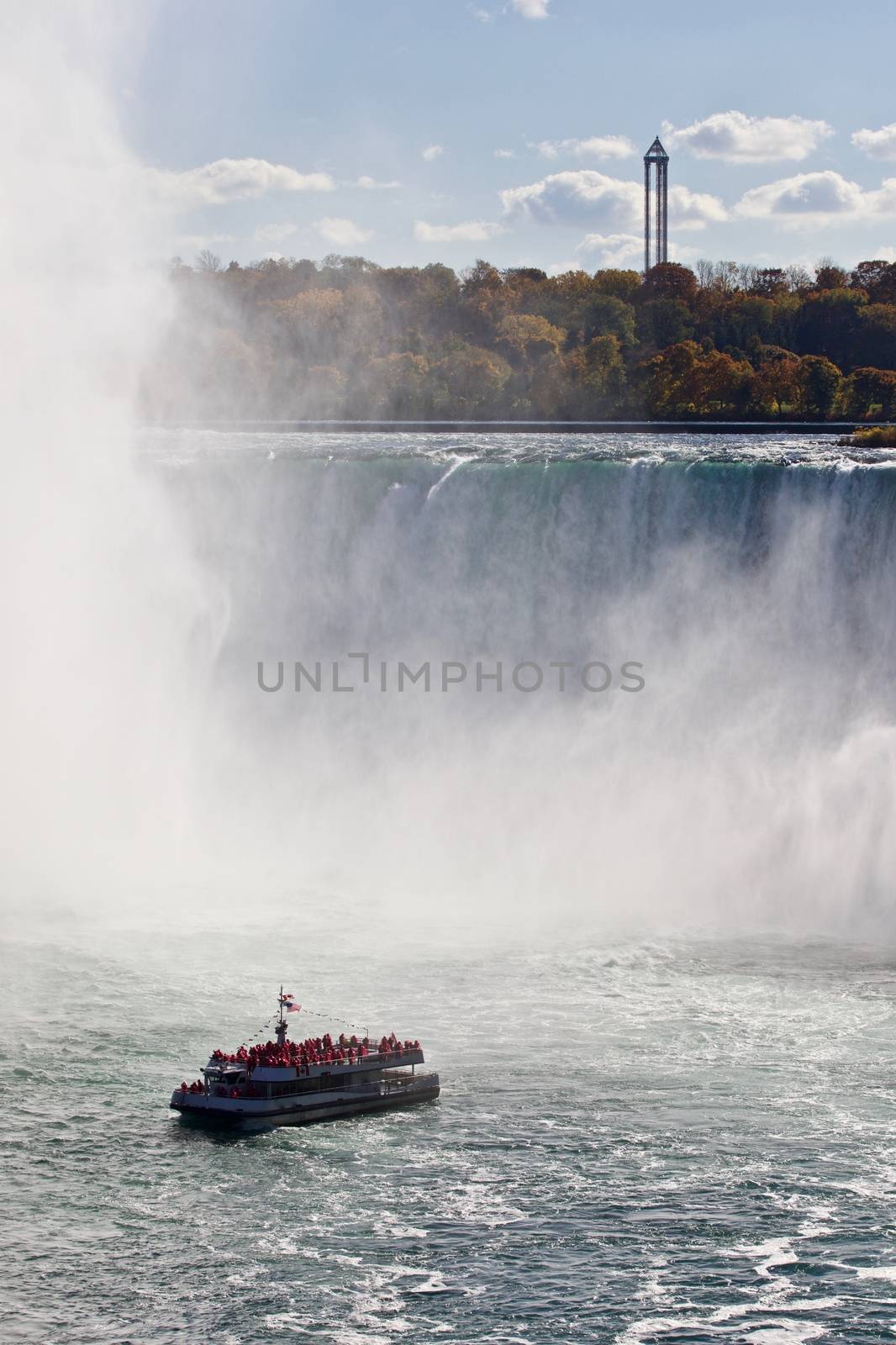 Beautiful background with amazing Niagara waterfall and a ship