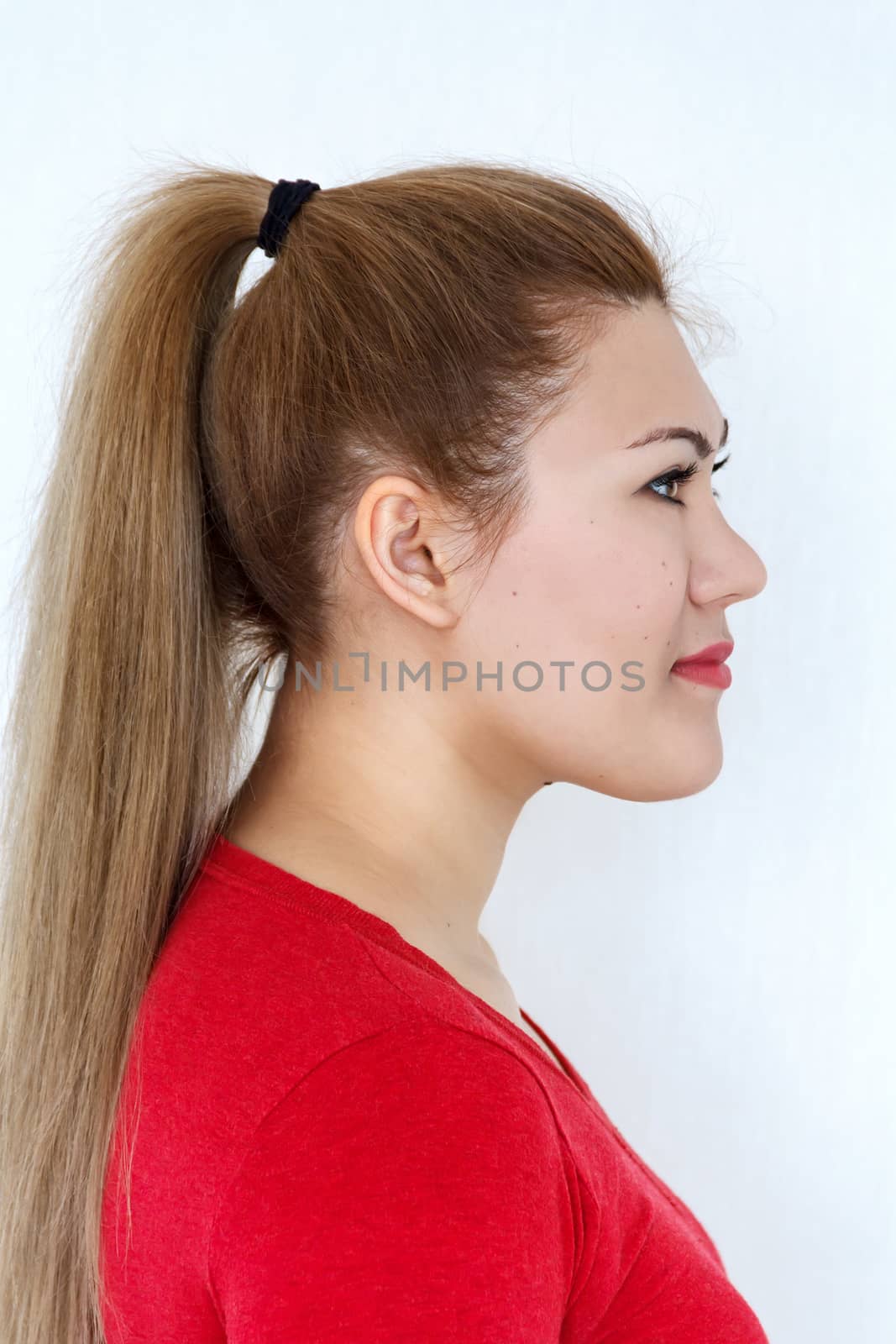 Ponytail Hairstyle. Beauty Fashion Model Girl with Long Healthy Straight Brown Hair. Beautiful Woman with brown long Healthy Smooth Straight hair