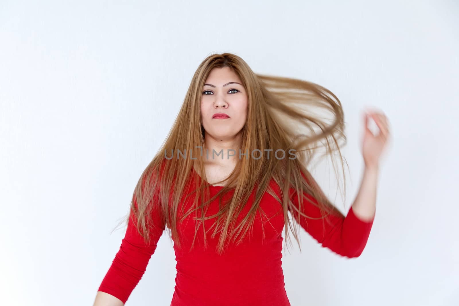 Horizontal attractive young girl with long brown healthy straight hair