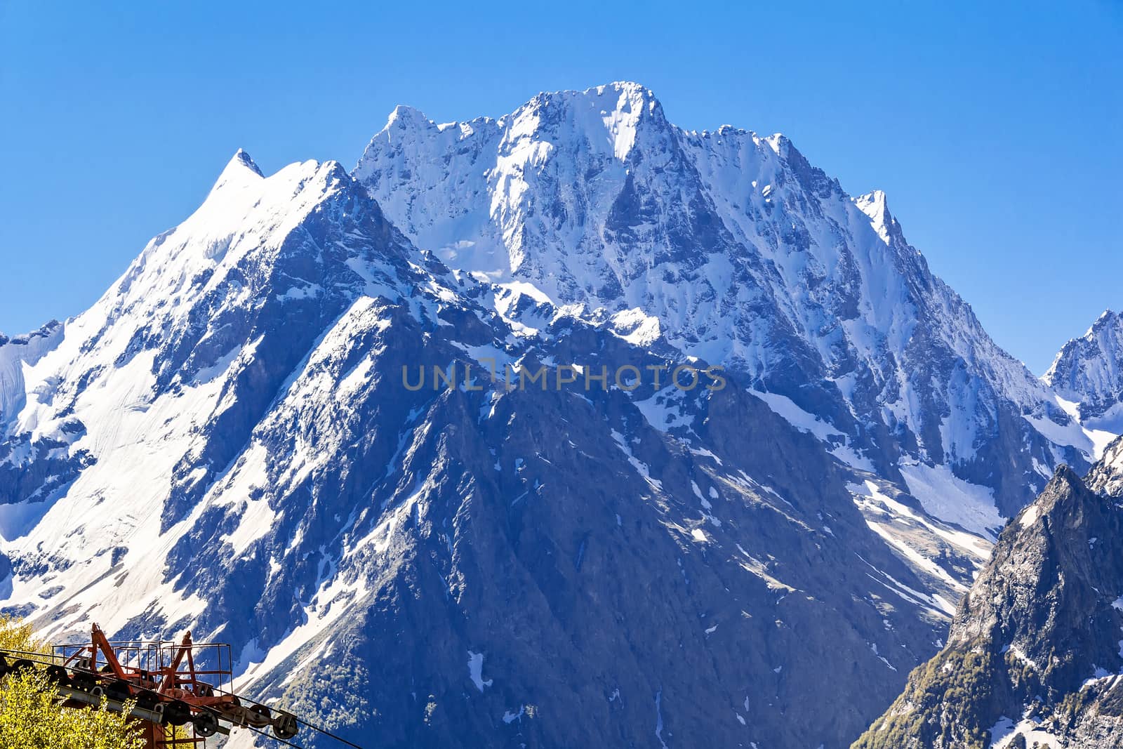 Blue landscape with Russian Caucasus rockies mountains