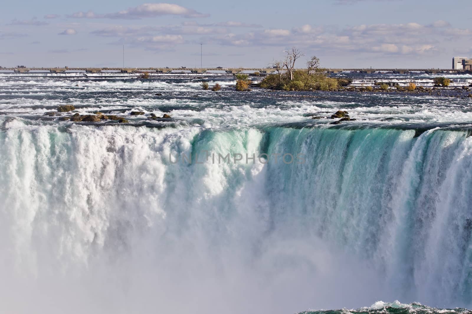 Beautiful isolated picture of amazing powerful Niagara waterfall by teo