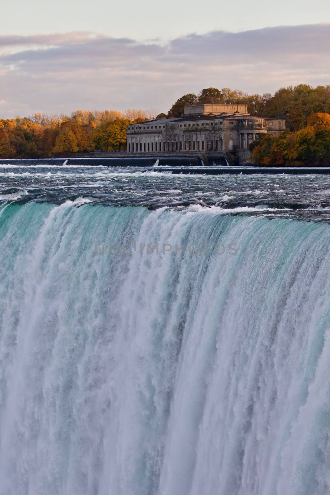 Beautiful isolated photo of amazing powerful Niagara waterfall by teo