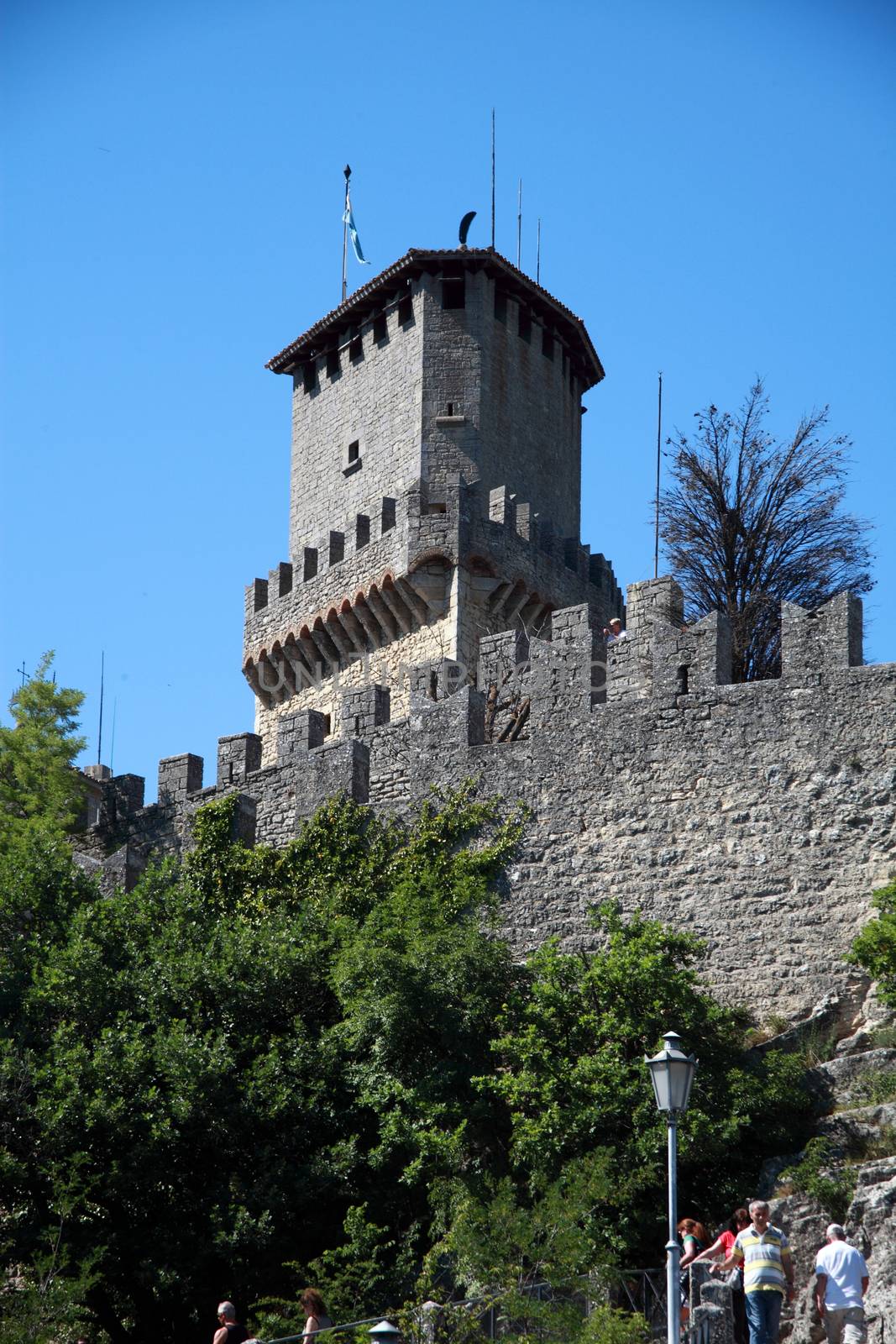 View of a tower and the walls of the San Marino Castle