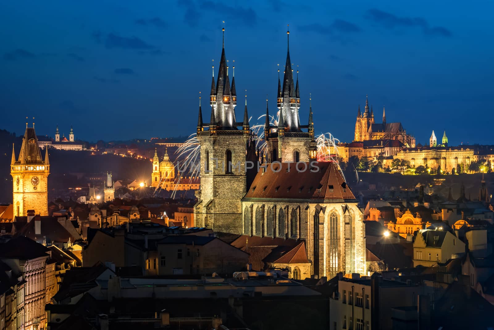 Night aerial view to Prague old town with Tyn church and St. Vitus cathedral