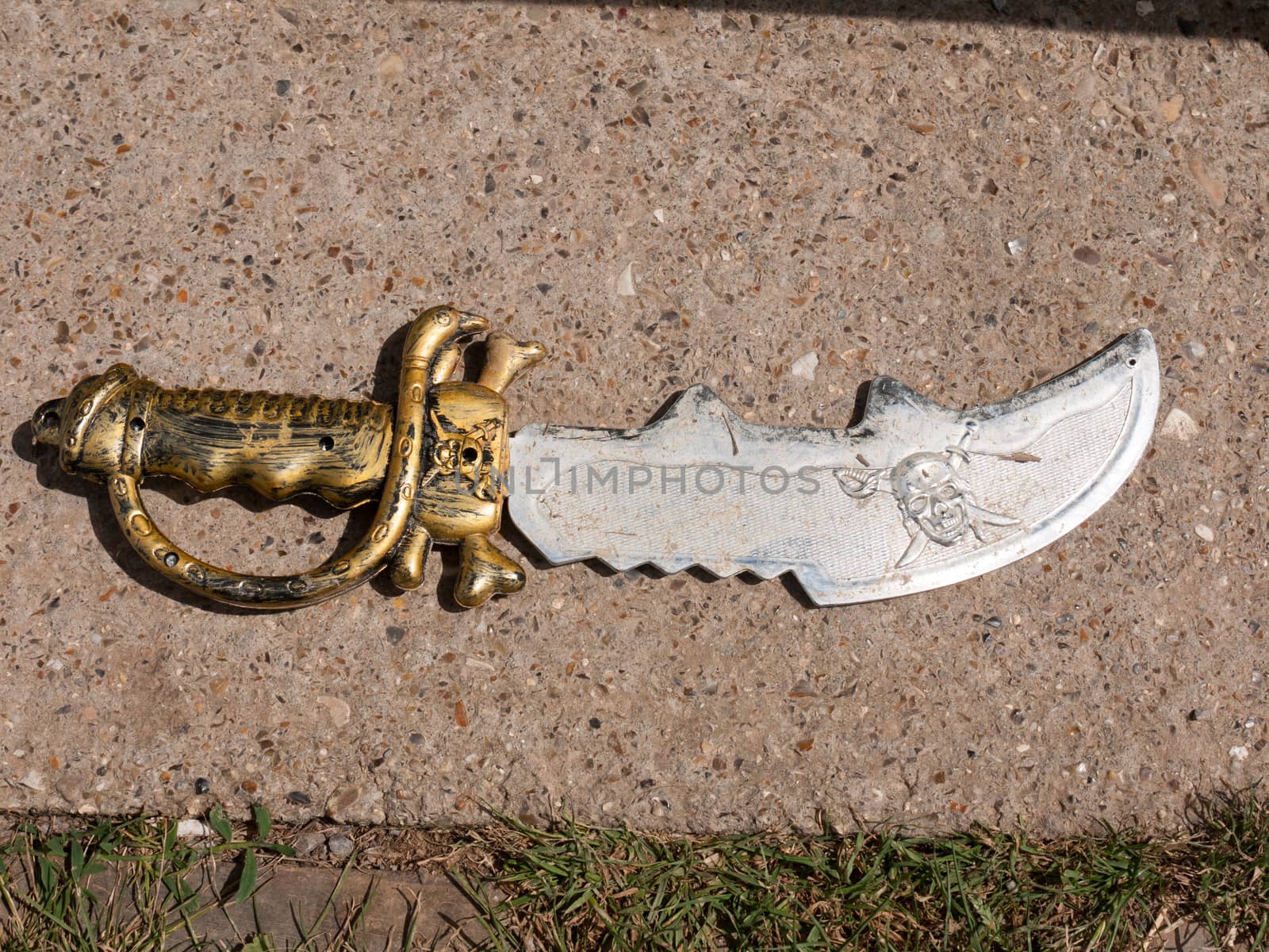 a child play toy sword outside