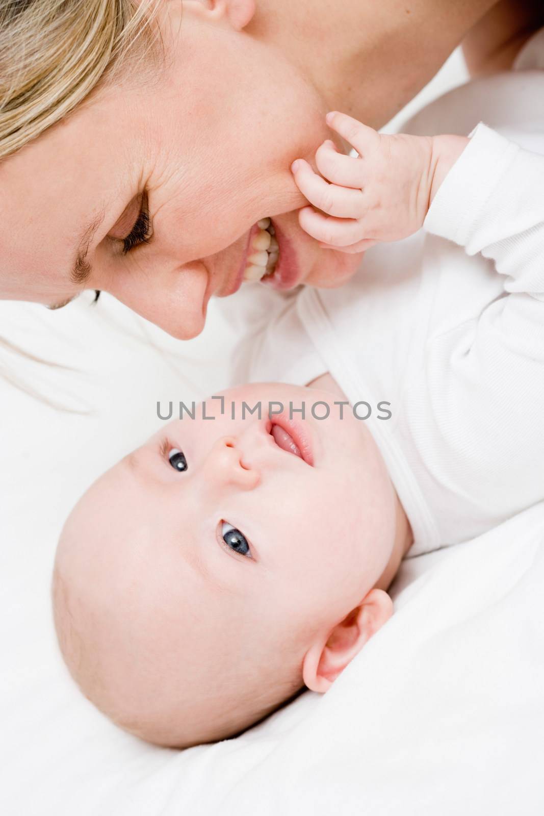 Mother hugging her baby