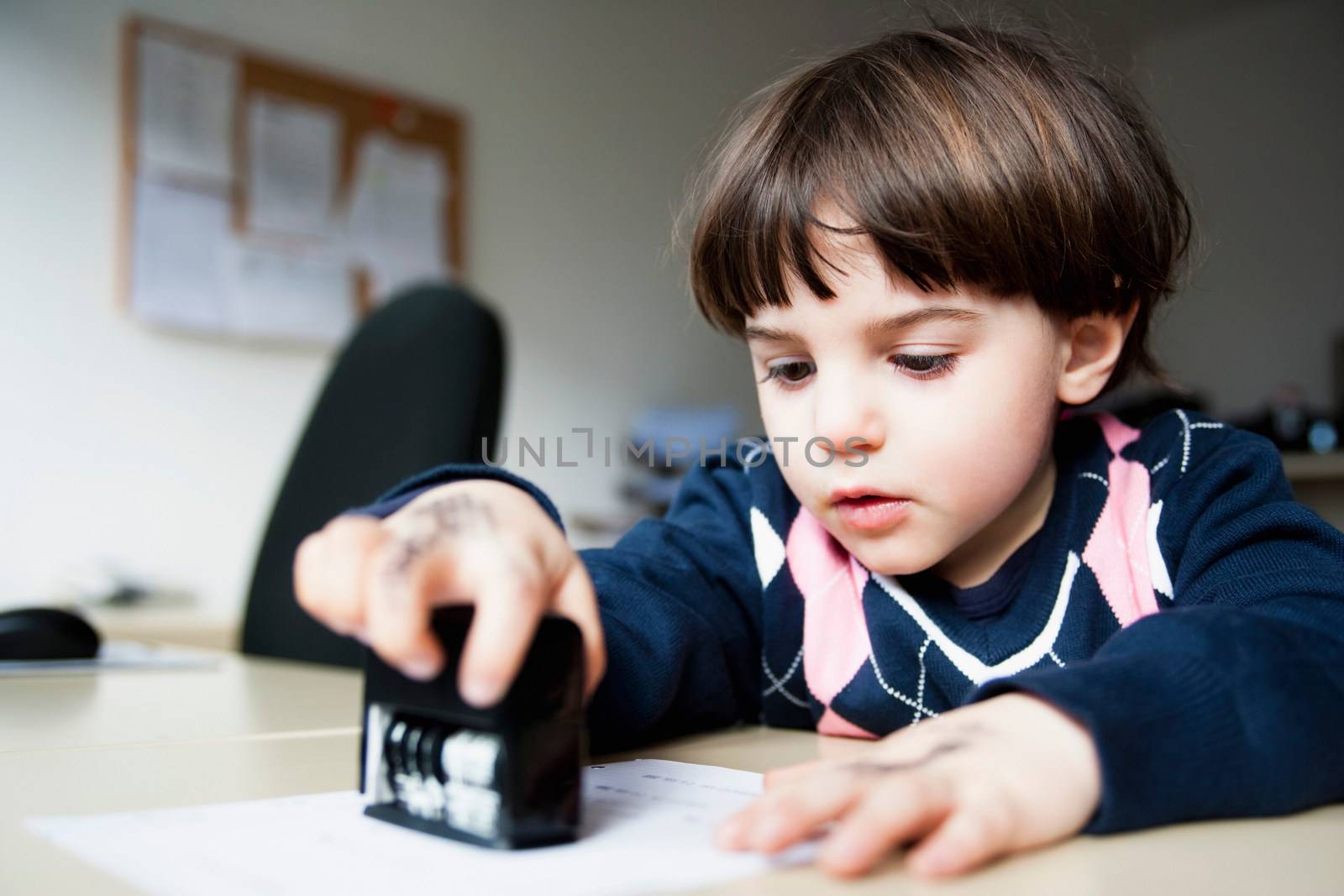 young boy with stamp