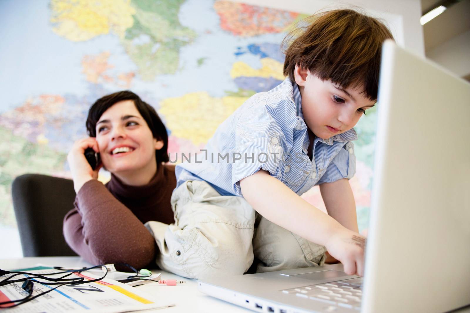 woman with boy in office