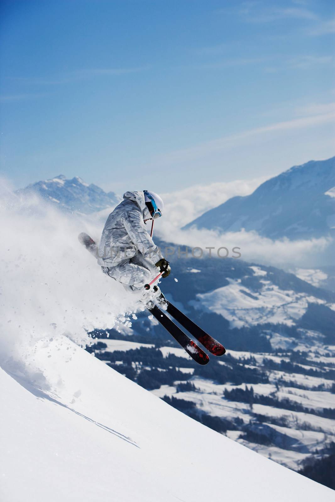 Man in white & grey camo suit airing.