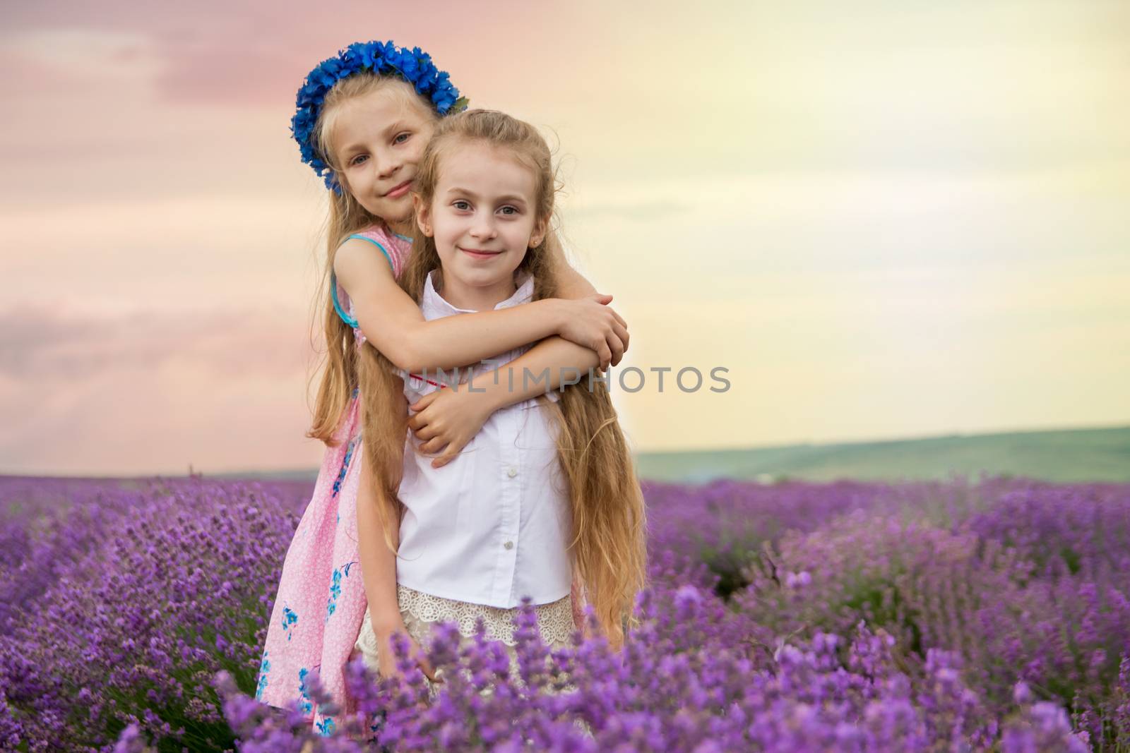 Cute girls hugging omong lavender field by Angel_a