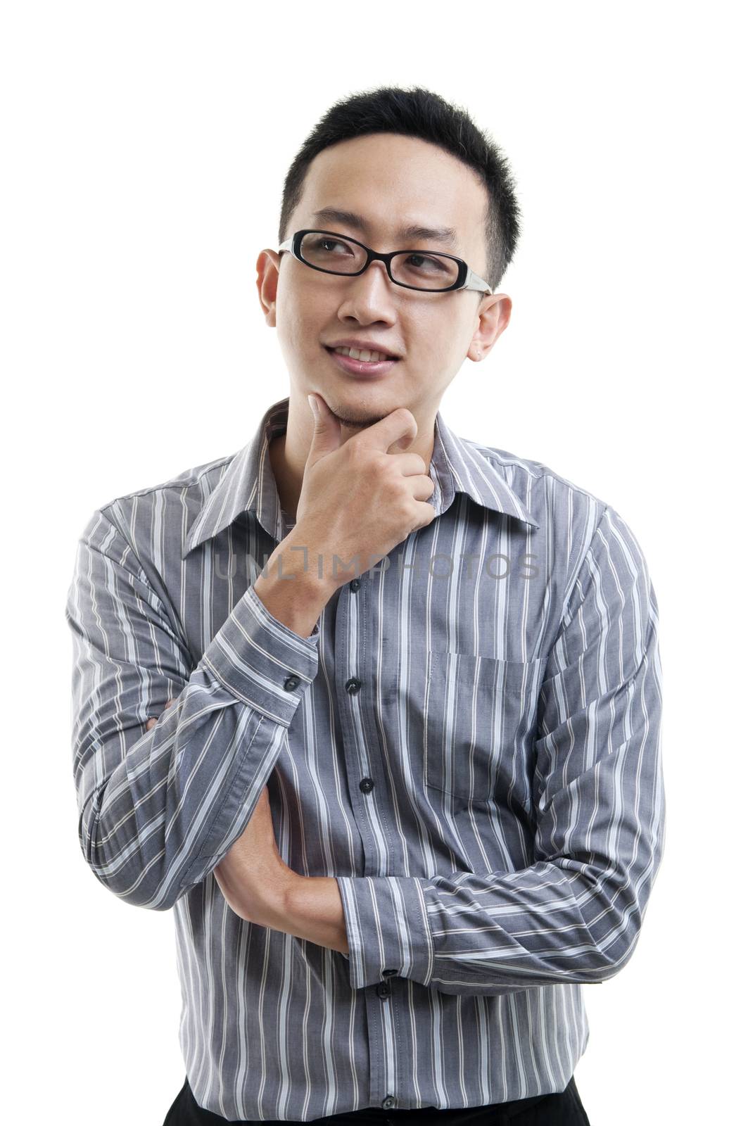 Asian male hand on chin having a thought, standing isolated on white background.