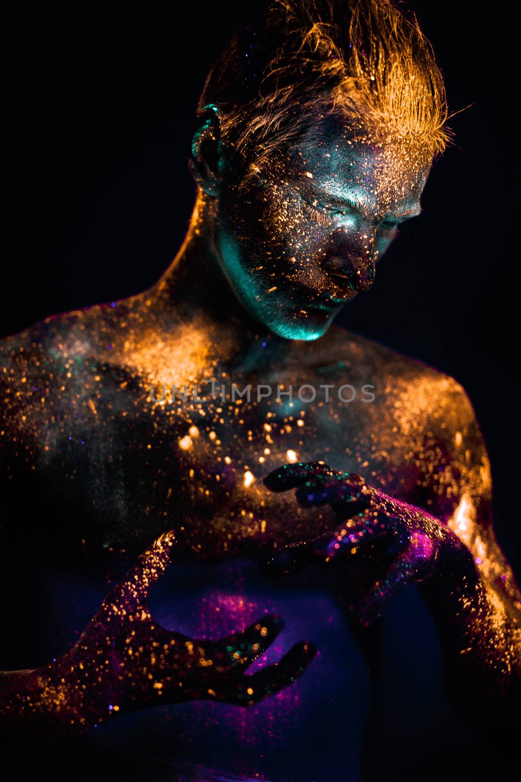 Portrait of a man painted in fluorescent UV colors. by Multipedia