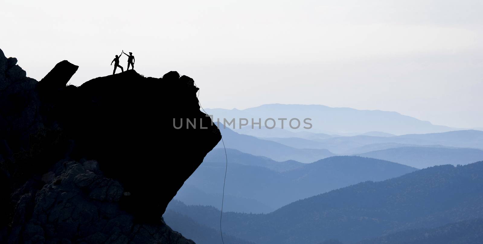 challenging rock climbing and success