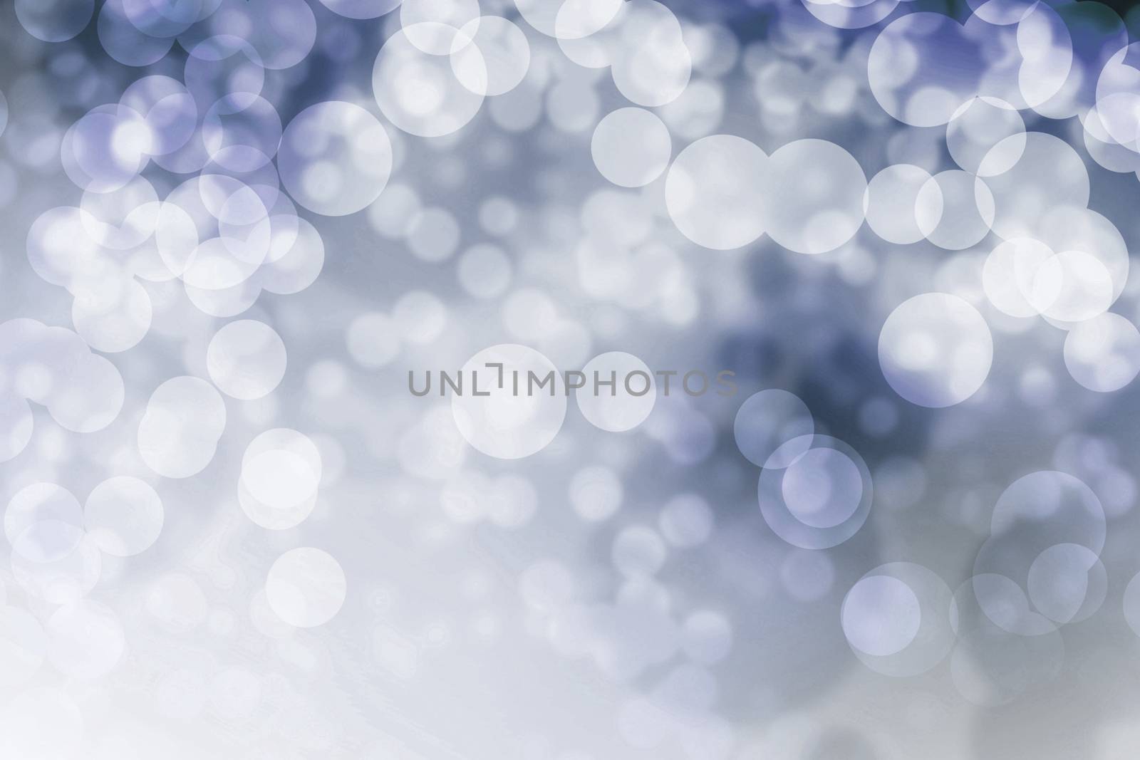 Abstract light bokeh as purple background