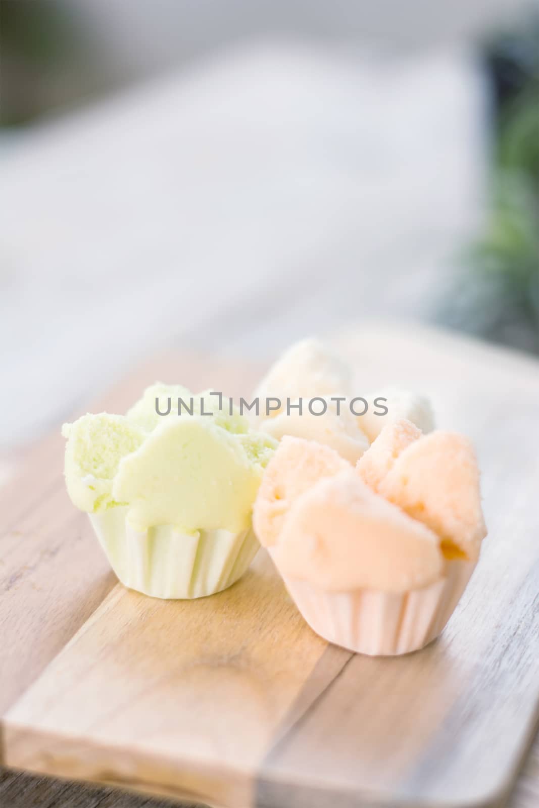 Cotton - wool cake on wooden, thai dessert, thai steamed cupcakes, muffin cup cake or cotton-wool cake