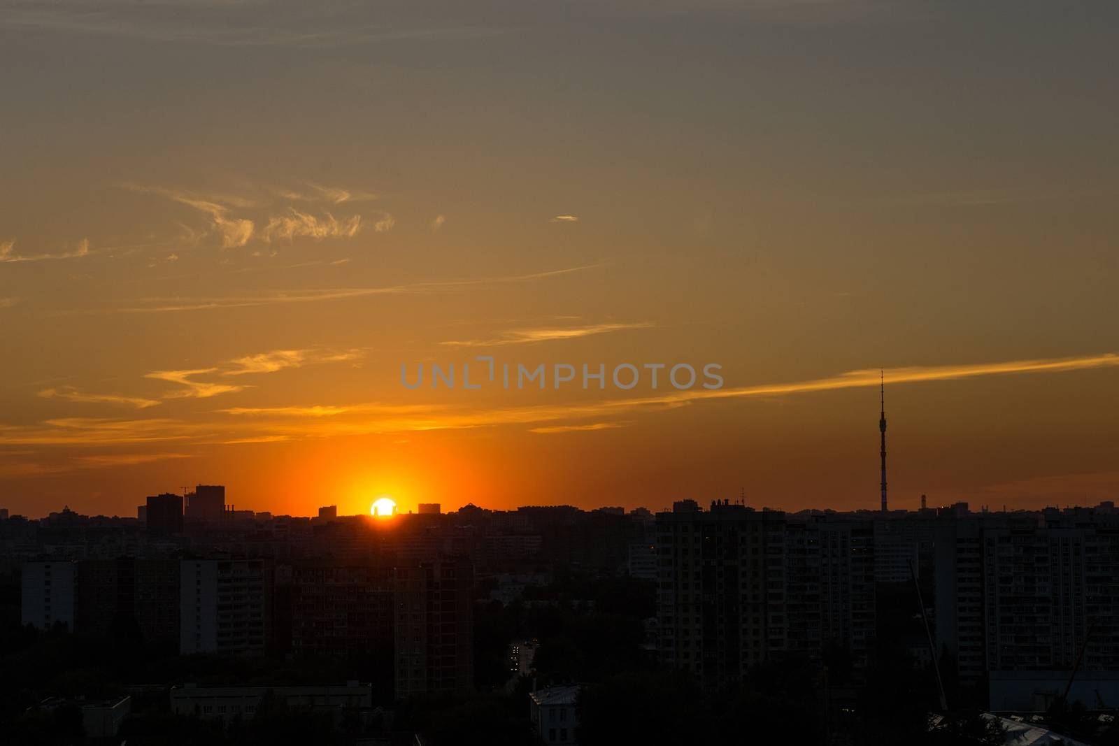 Silhouette of Moscow at sunset, Ostankino TV tower, summer