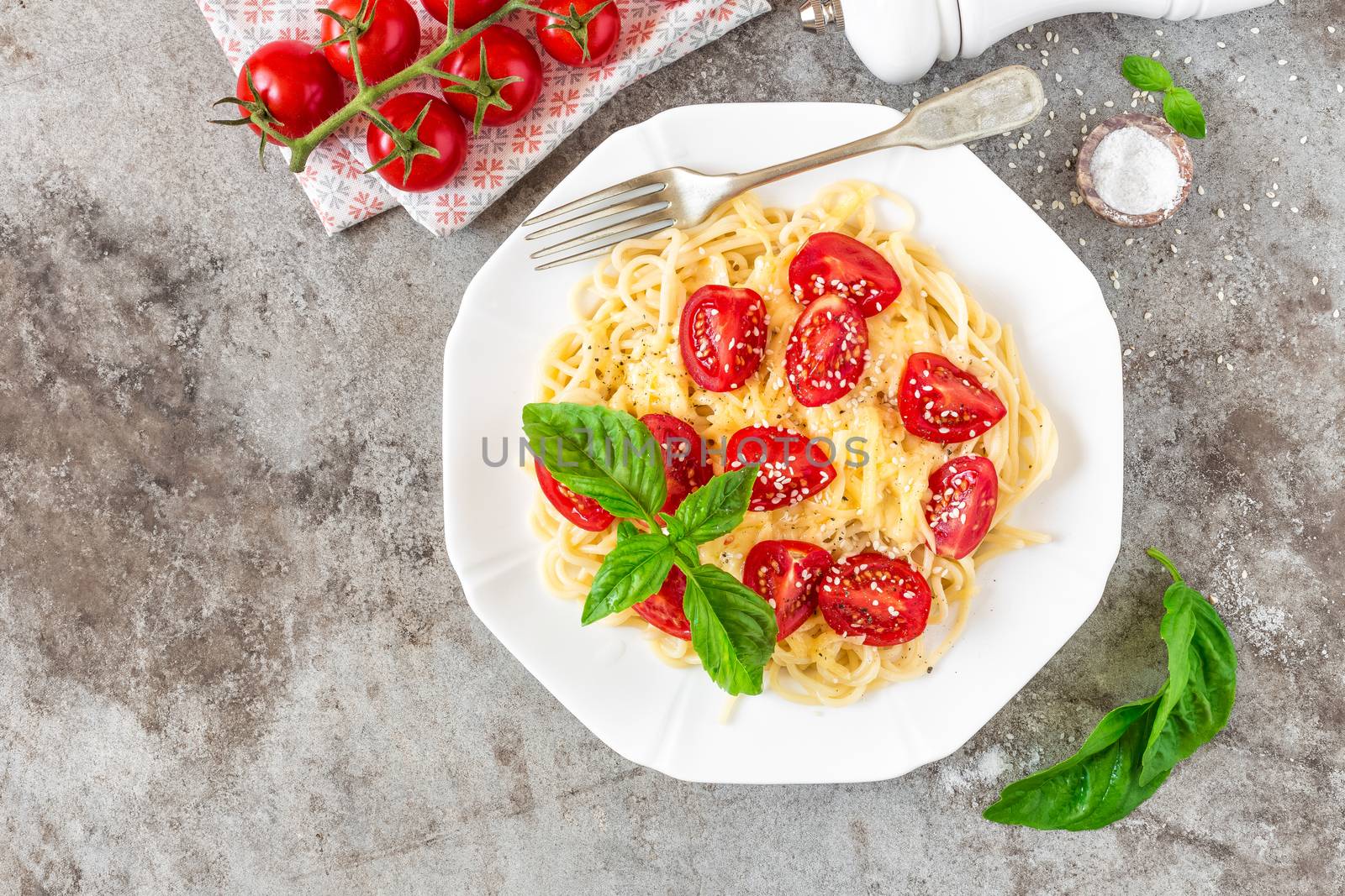 Spaghetti with tomatoes, basil and cheese by yelenayemchuk