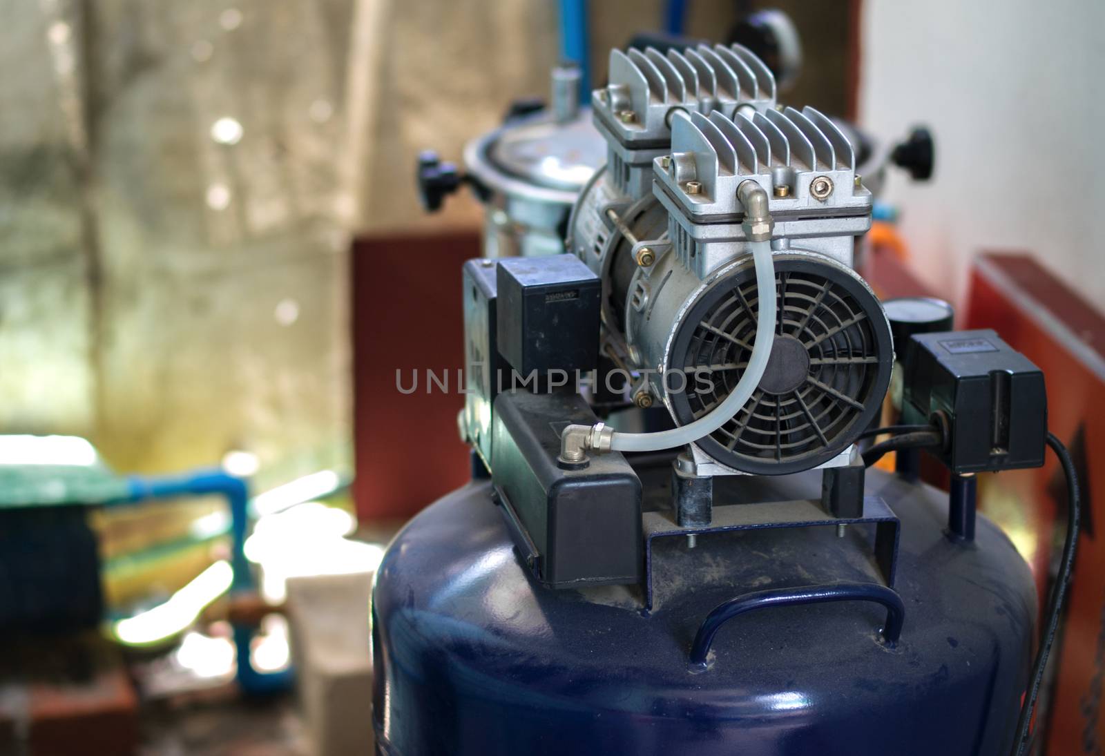 COLOR PHOTO OF RECIPROCATING COMPRESSOR OR PISTON COMPRESSOR