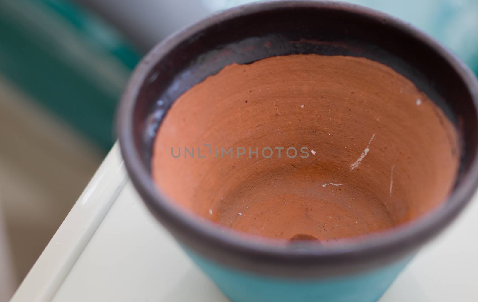 COLOR PHOTO OF CLOSE-UP OF CLAY POT TEXTURE