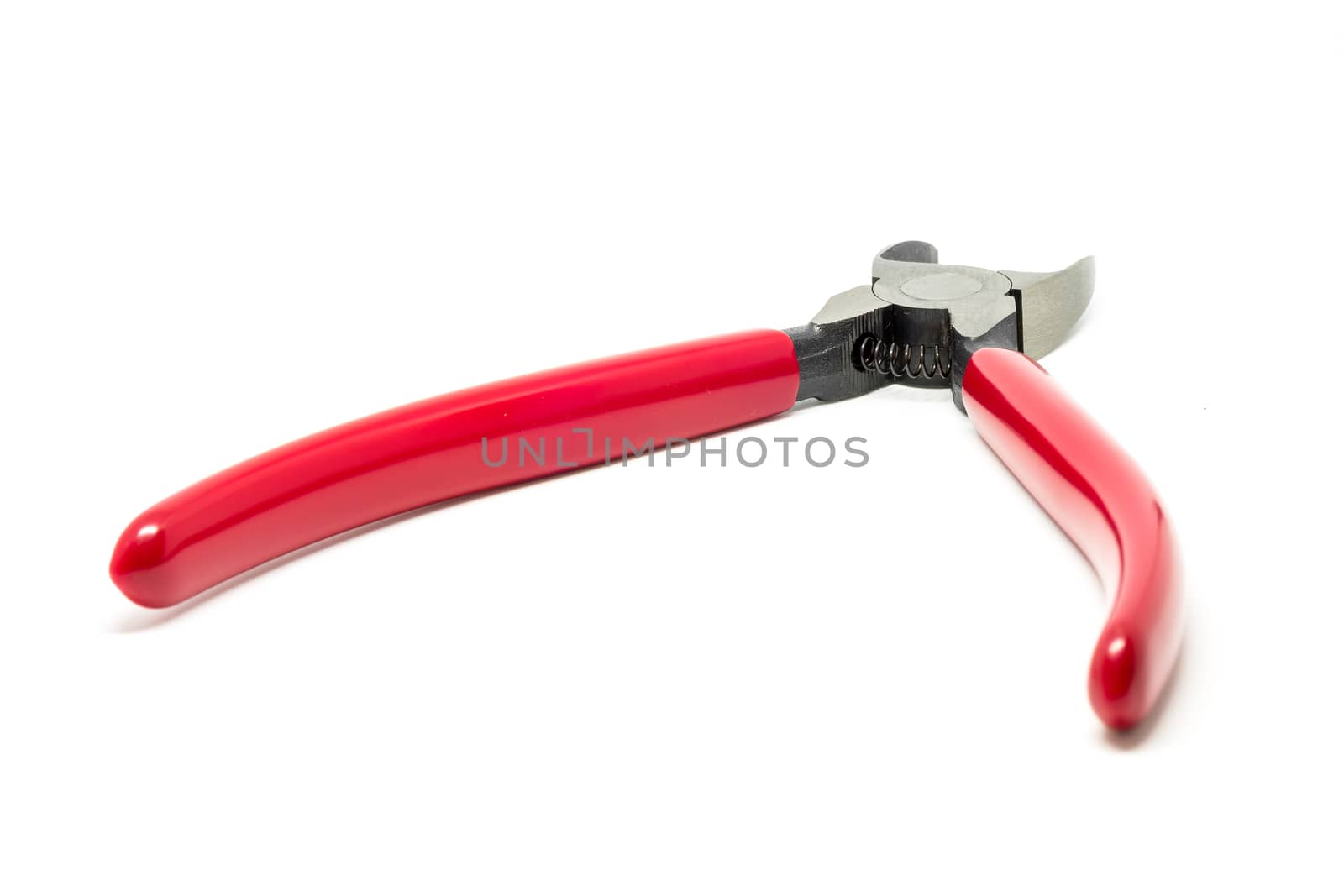 Red open and handled pliers  on a white background.Tools series.