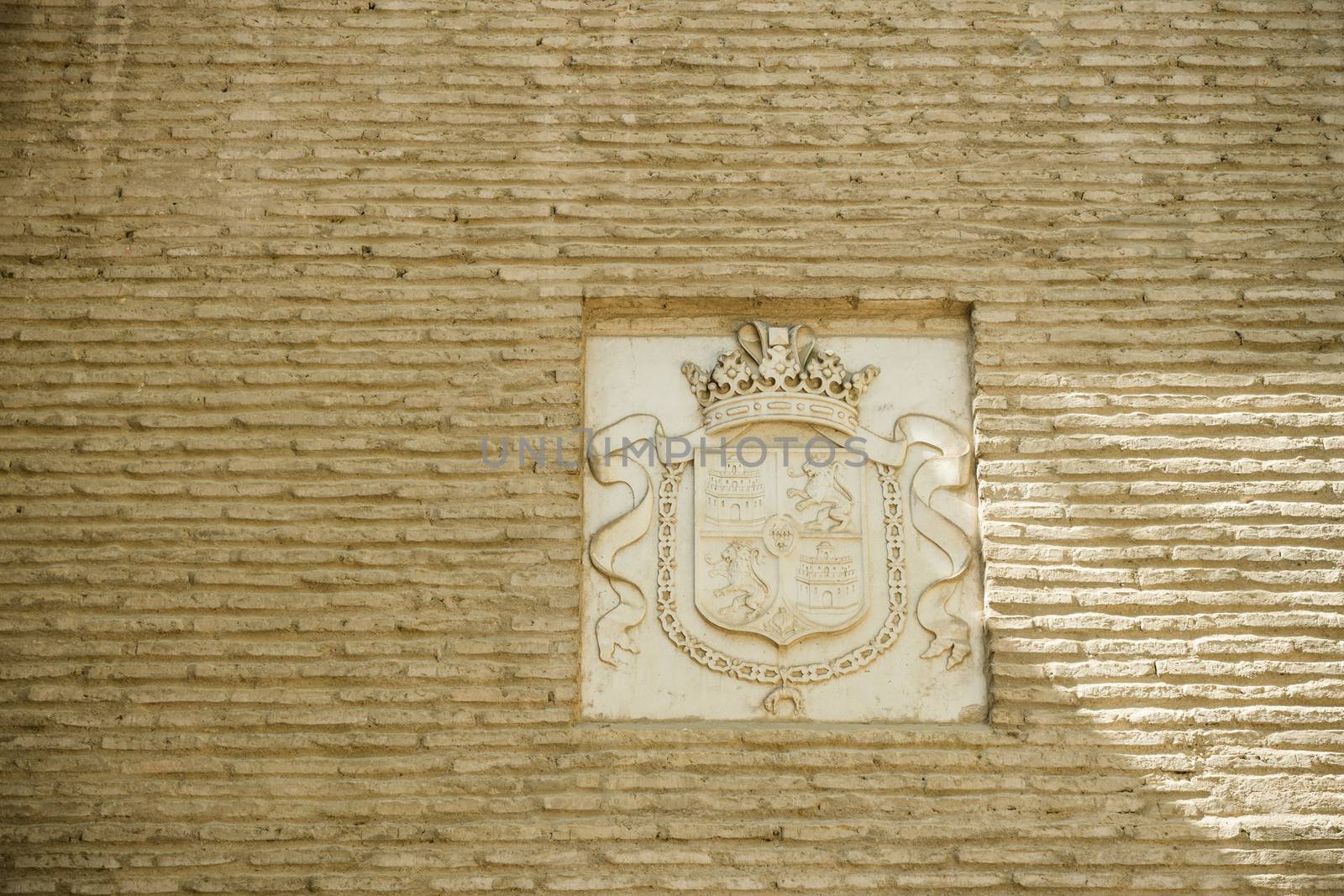 Design pattern insignia on a wall in Seville, Spain, Europe