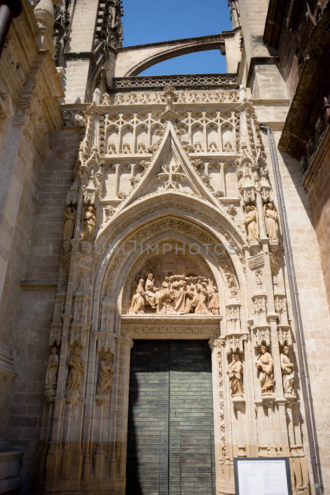 The Door of the gothic church in Seville, Spain, Europe by ramana16