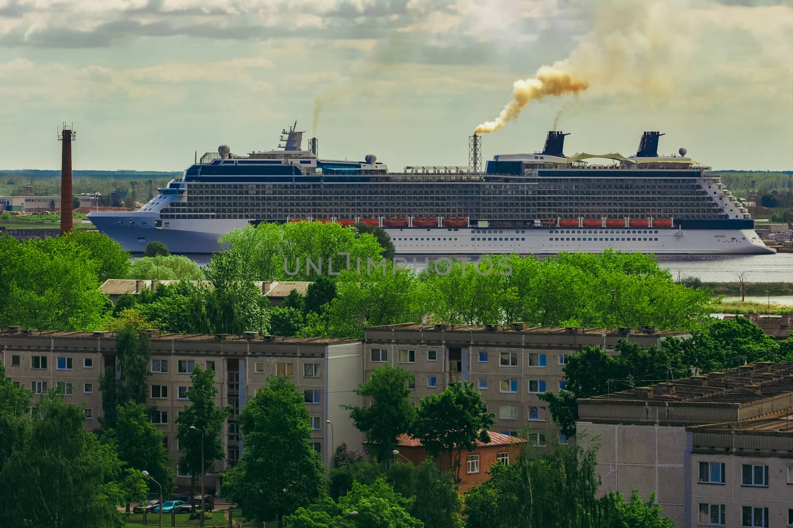 Large cruize liner. Passenger ship moored in old town