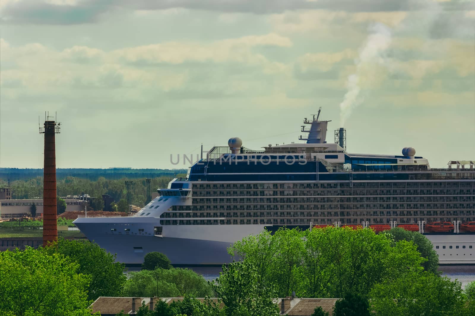 Large cruize liner. Passenger ship moored in old town