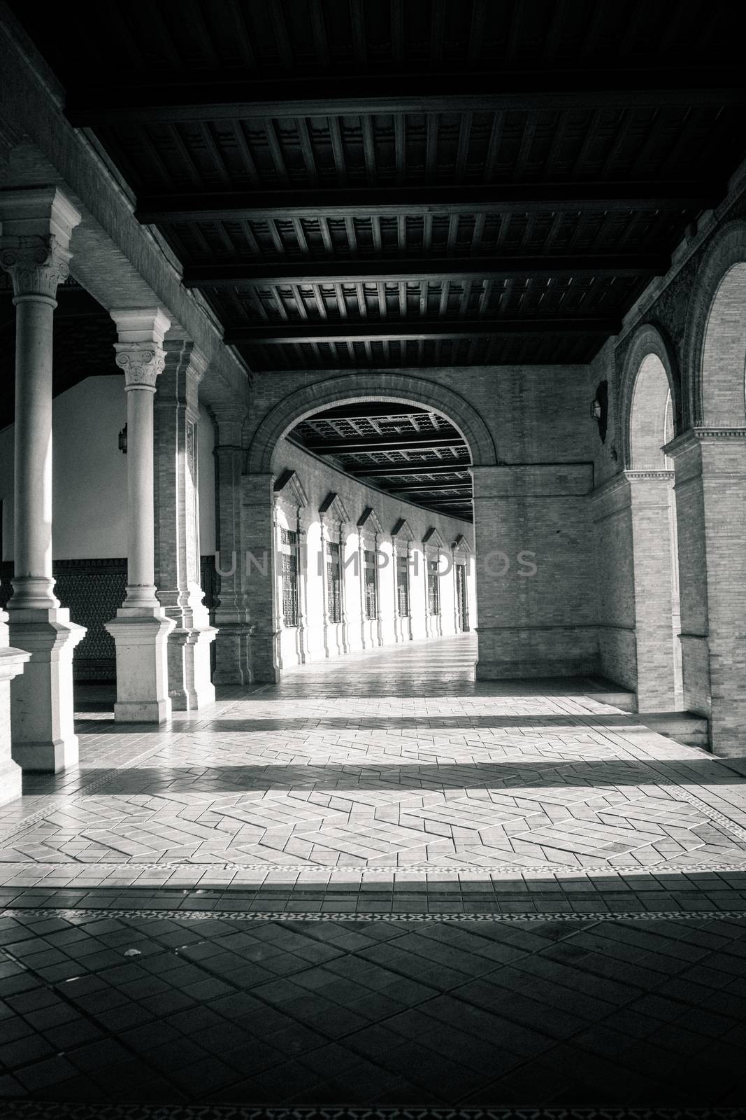 Corridors and pillars in Plaza de Espana in Seville, Spain, Europe