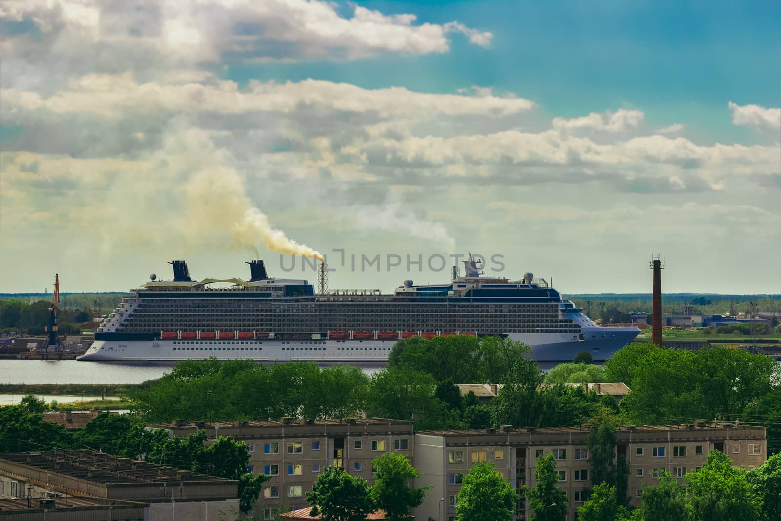 Large cruize liner. Passenger ship moored in old town